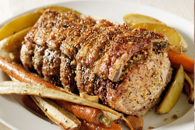 Pork “Prime Rib” and Orange Blackberry Balsamic Reduction Sauce